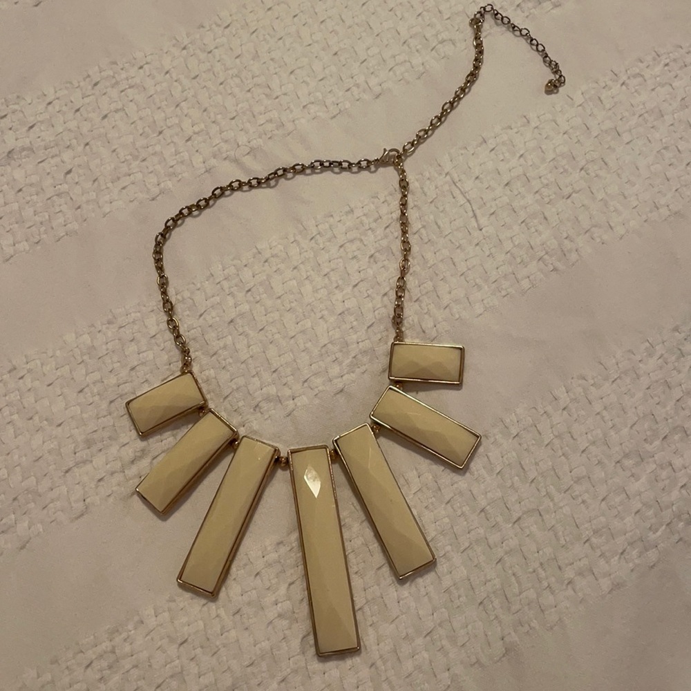 Beige and gold necklace.
